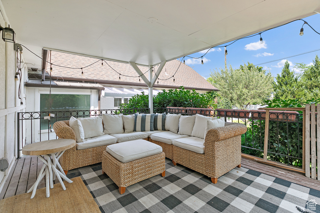 Wooden deck with an outdoor hangout area