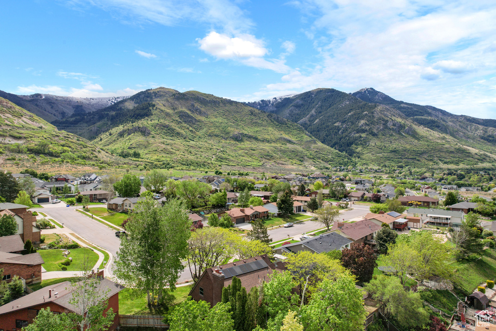 View of mountain backdrop with nearby suburban area