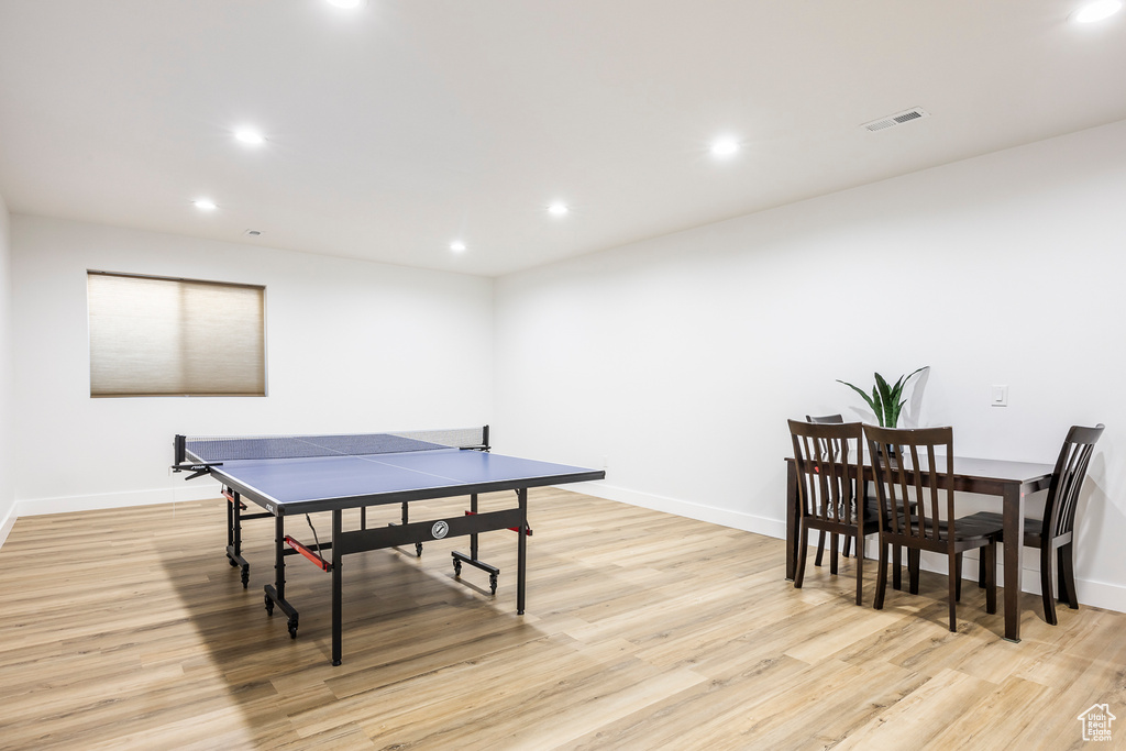 Rec room featuring light wood-style floors, recessed lighting, and baseboards
