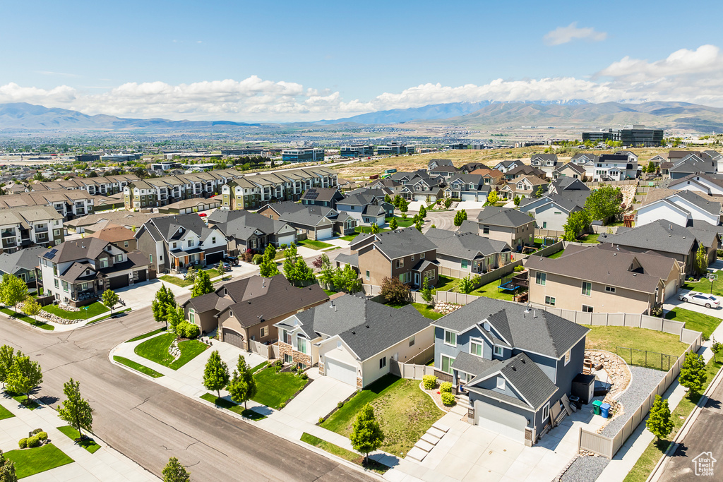 Aerial view of residential area with a mountain backdrop