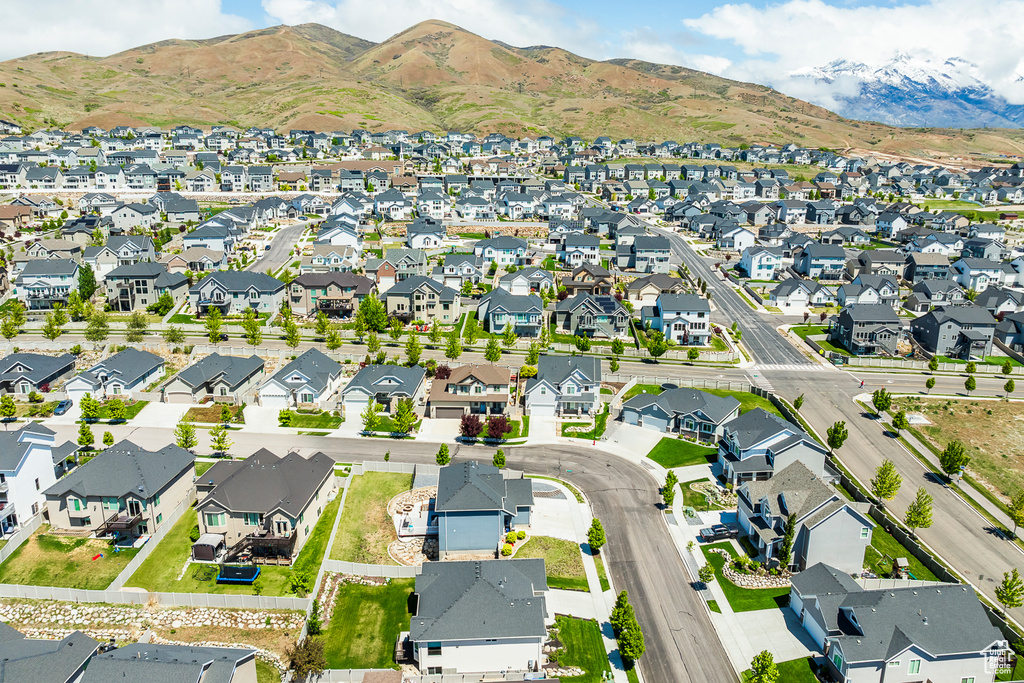 View of property location featuring nearby suburban area and a mountainous background