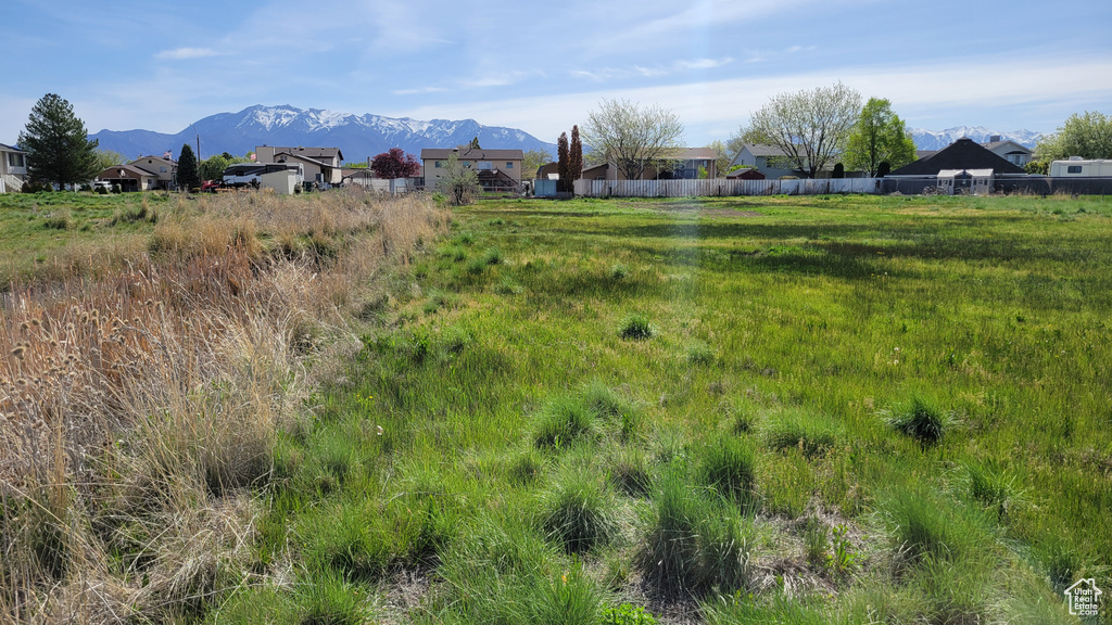 View of mountain background featuring nearby suburban area