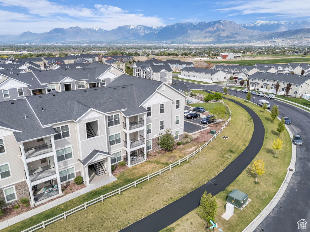 Aerial view of residential area with a mountainous background