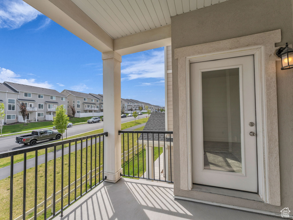 Balcony featuring a residential view