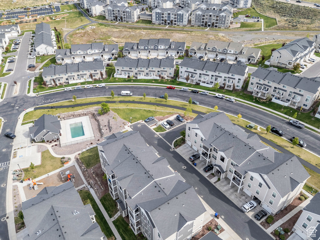 Aerial view of property's location featuring nearby suburban area