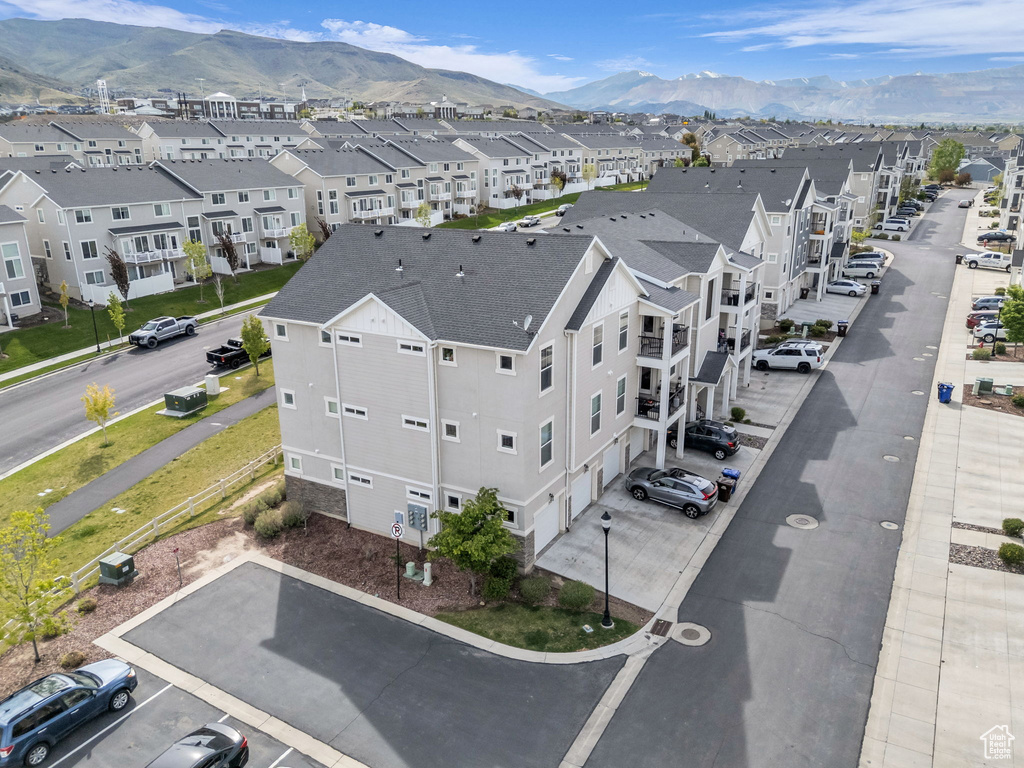 Aerial view of residential area with a mountainous background