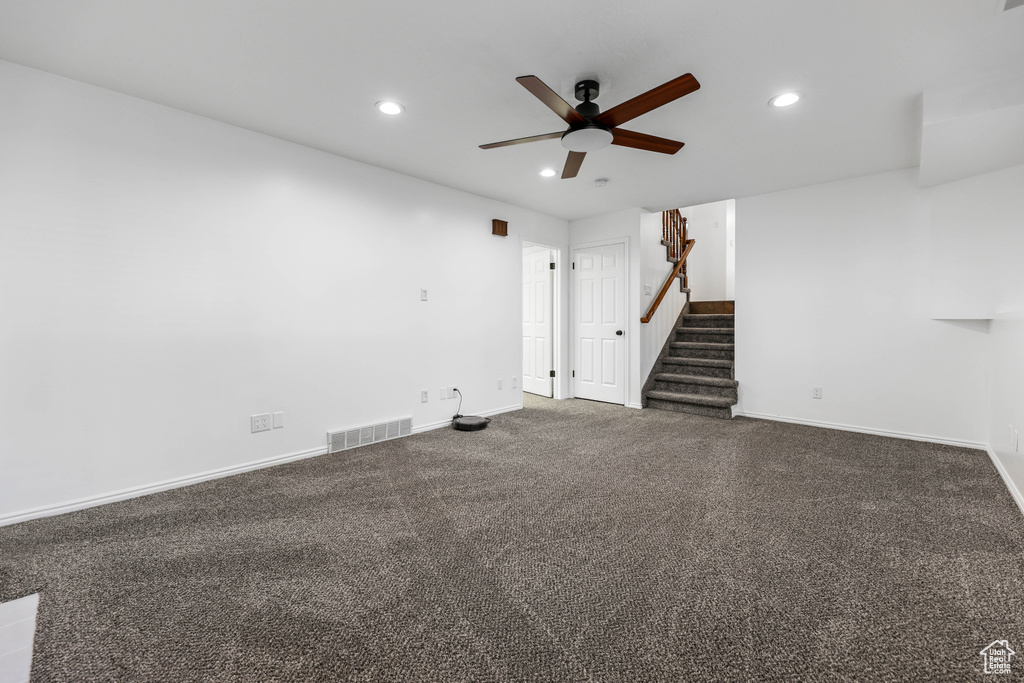 Unfurnished room featuring stairway, a ceiling fan, recessed lighting, baseboards, and carpet flooring