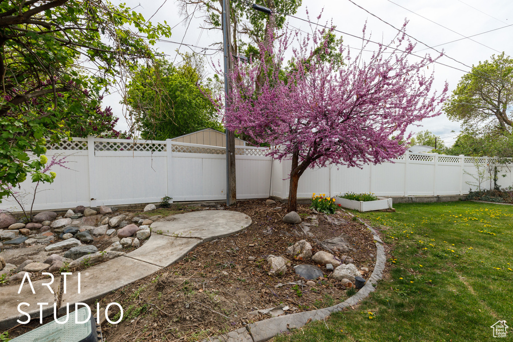 View of yard featuring a fenced backyard