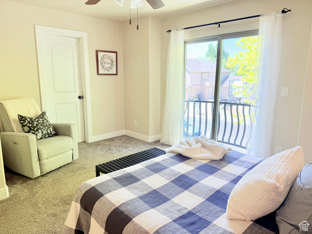 Bedroom with carpet flooring and a ceiling fan