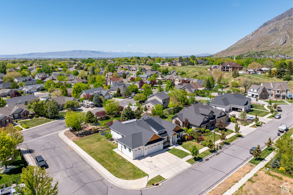 Birds eye view of property featuring a residential view and a mountain view