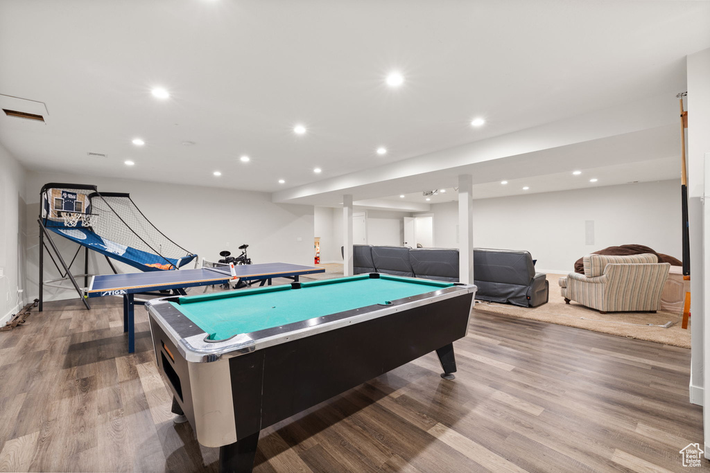 Game room with baseboards, recessed lighting, pool table, and wood finished floors