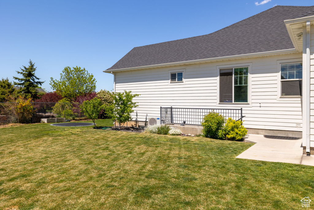 View of yard with a patio