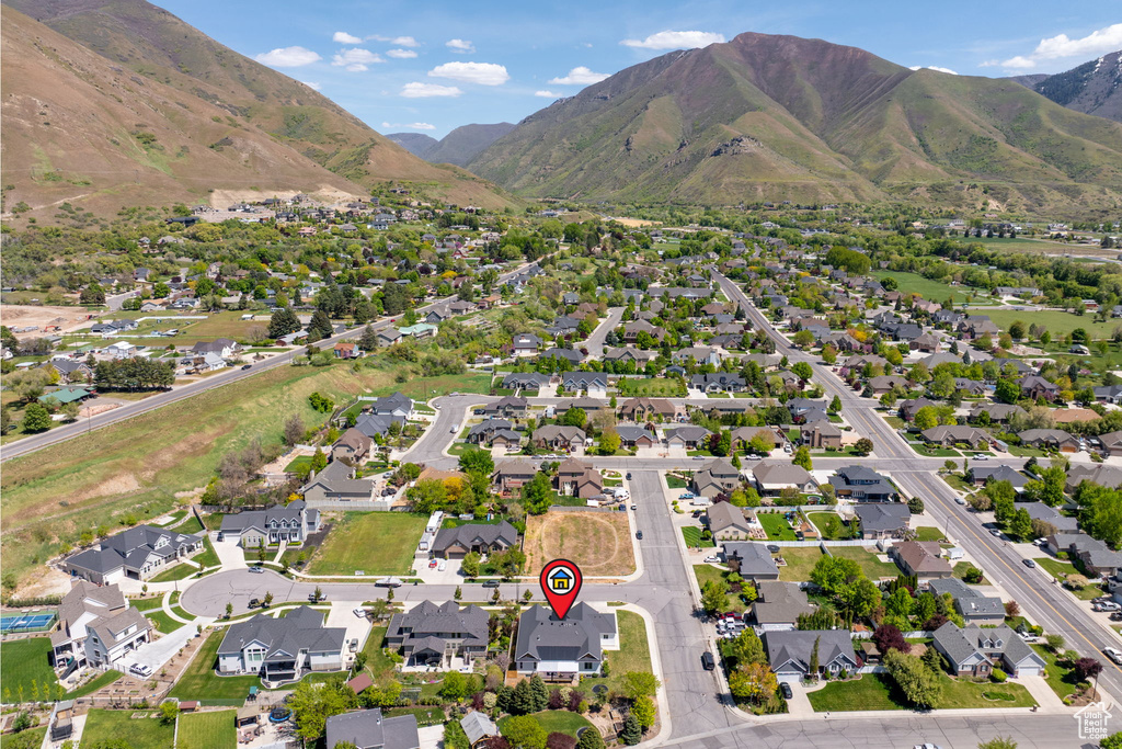 Drone / aerial view featuring a mountain view and a residential view