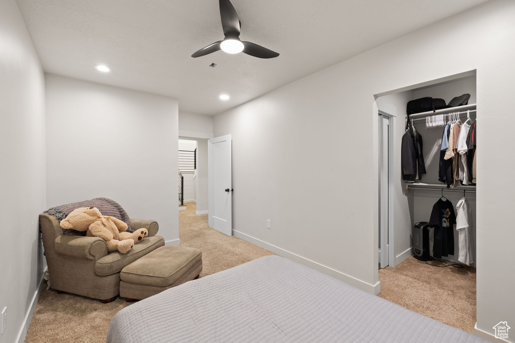 Bedroom featuring carpet floors, recessed lighting, baseboards, and a closet