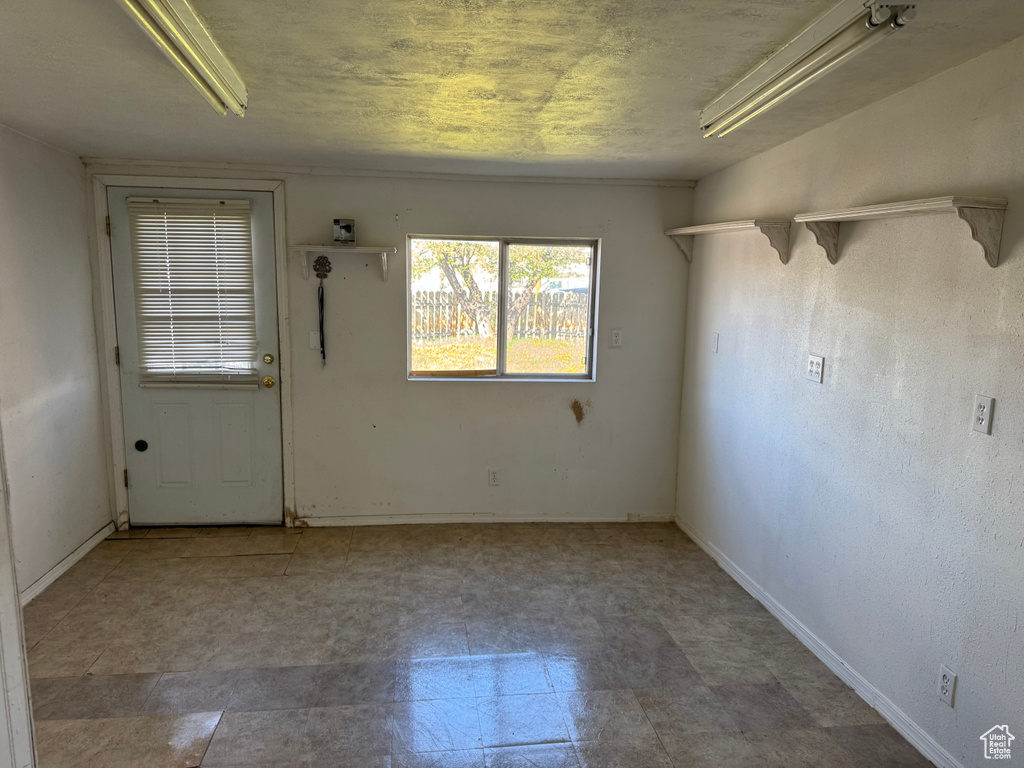 Empty room with baseboards