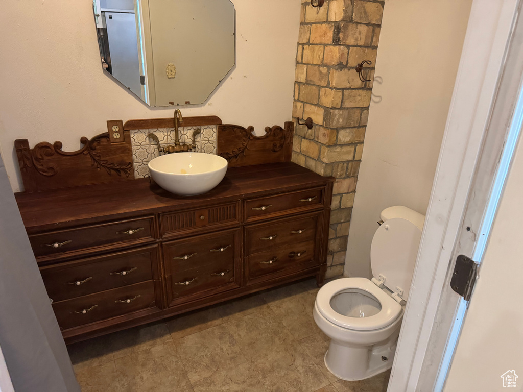 Bathroom with vanity and toilet