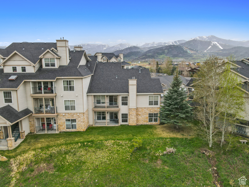 Exterior space featuring a mountain view and a residential view