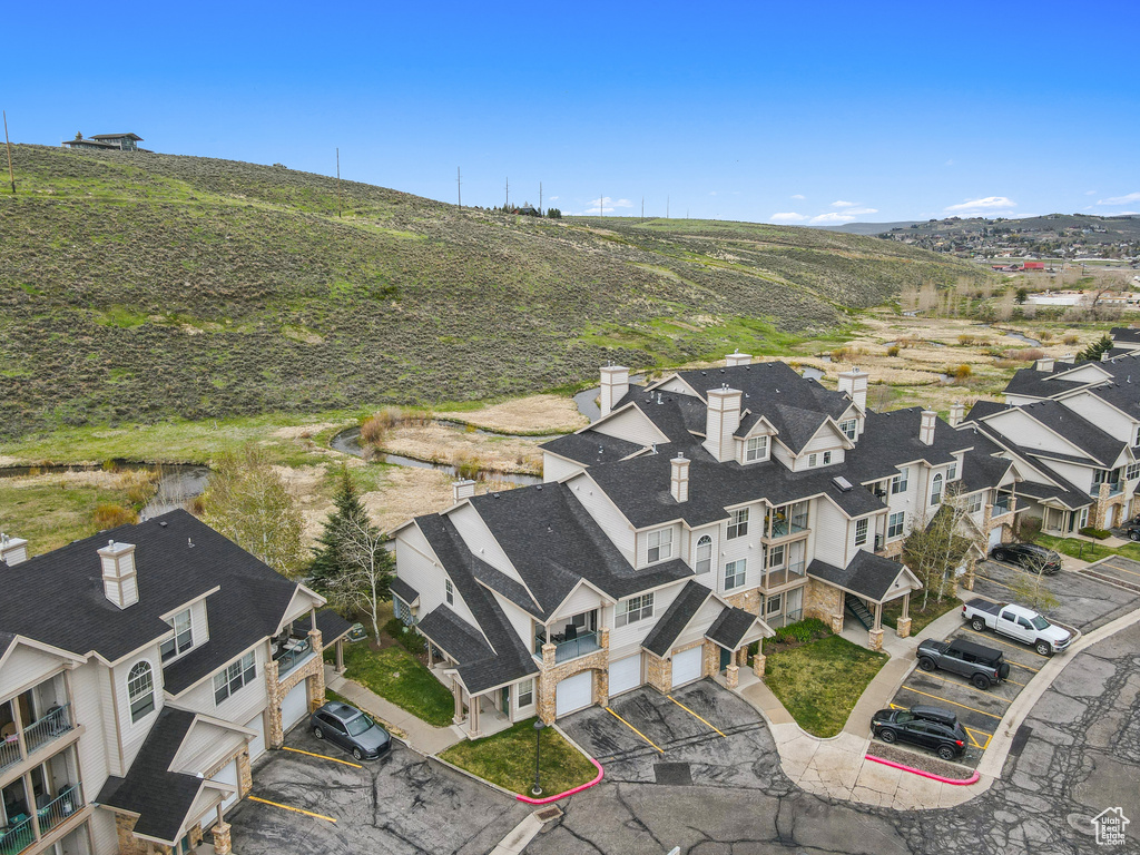 Birds eye view of property with a residential view