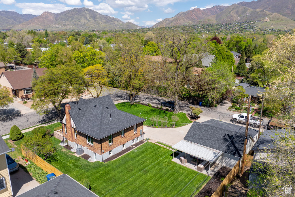 View of subject property featuring mountains