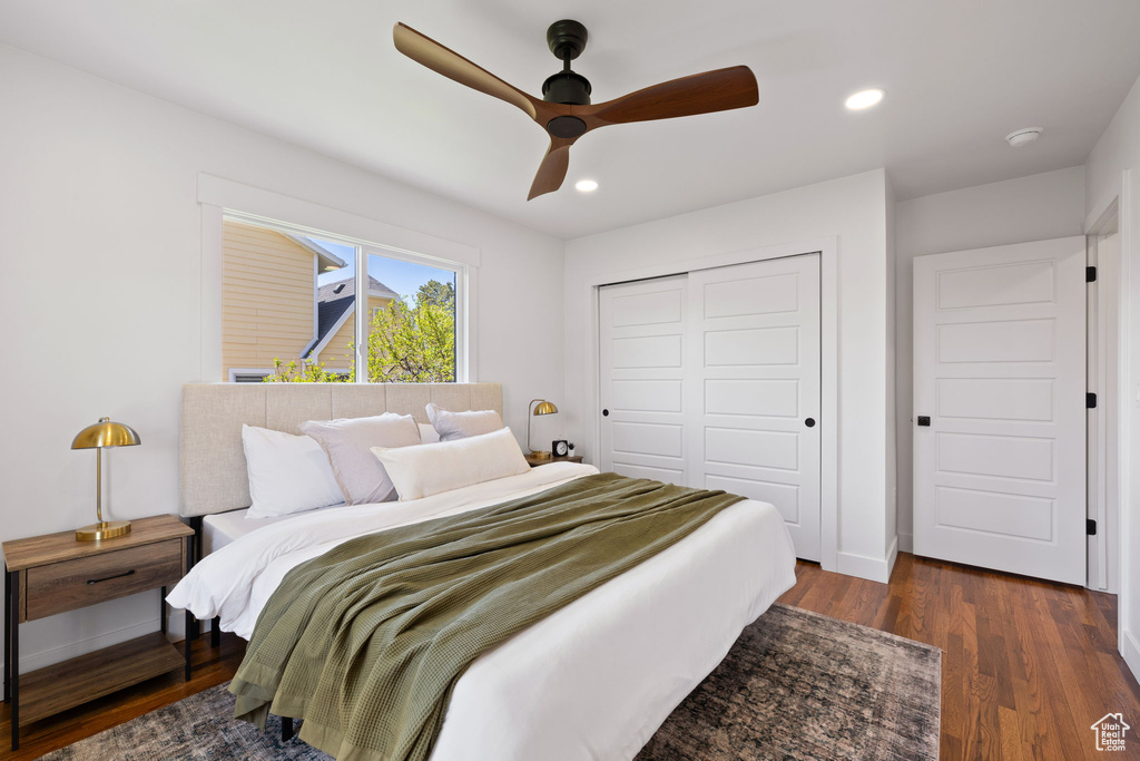 Bedroom featuring a closet, wood finished floors, recessed lighting, and ceiling fan