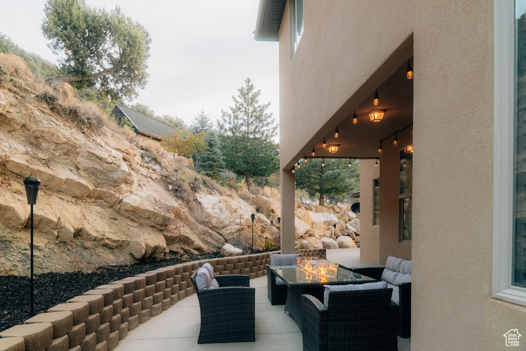 View of patio / terrace featuring a fire pit