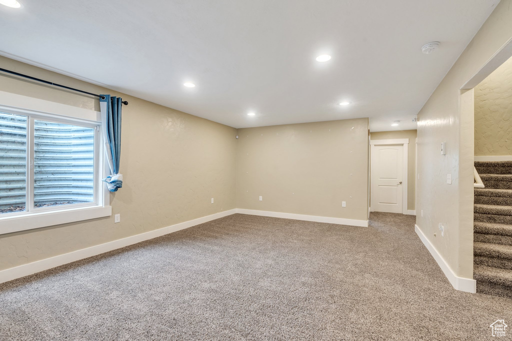 Basement with stairway, carpet, baseboards, and recessed lighting