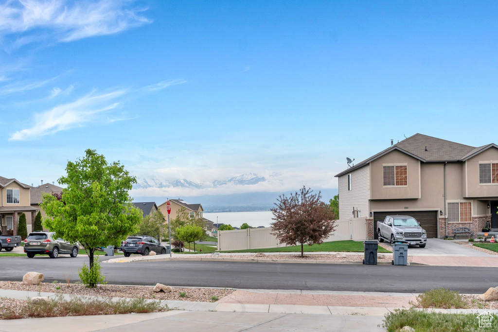 View of road featuring sidewalks and a residential view