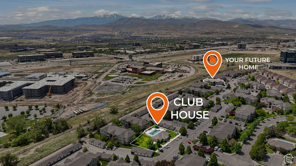 Aerial view of property\'s location featuring mountains