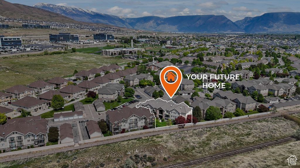 Aerial perspective of suburban area featuring mountains