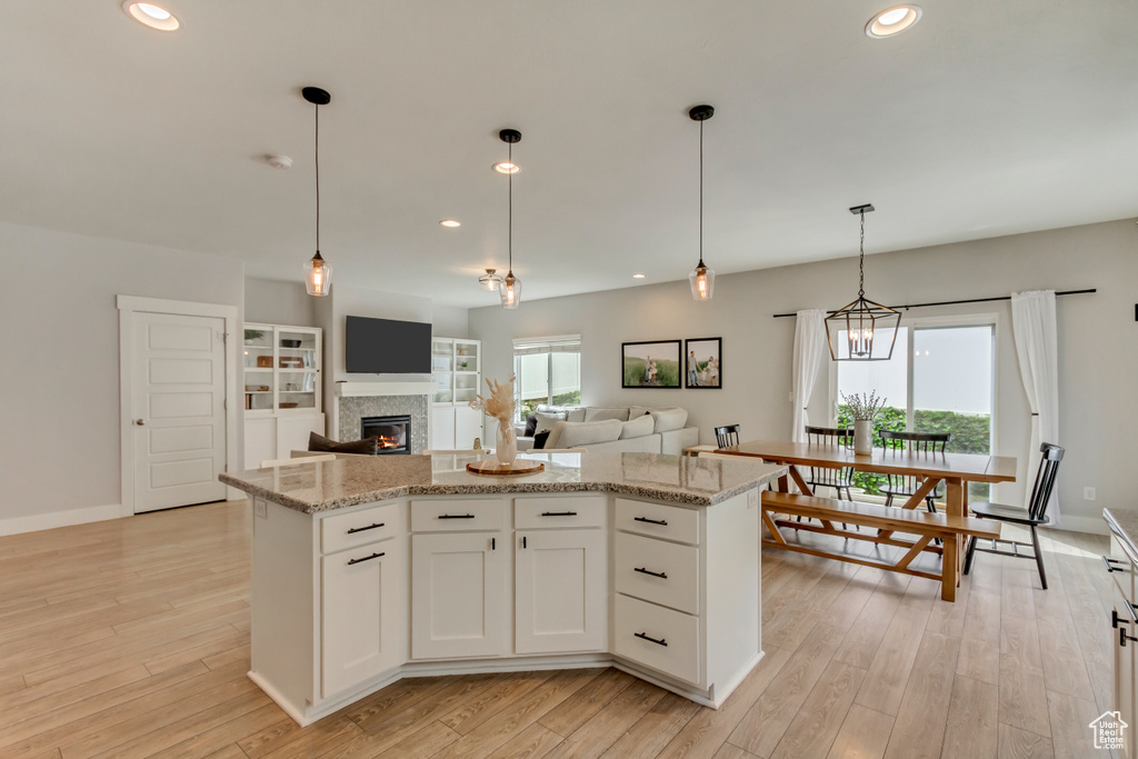 Kitchen with a wealth of natural light and recessed lighting