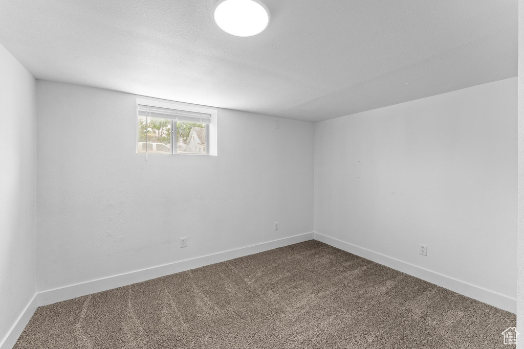 Spare room with carpet flooring and baseboards