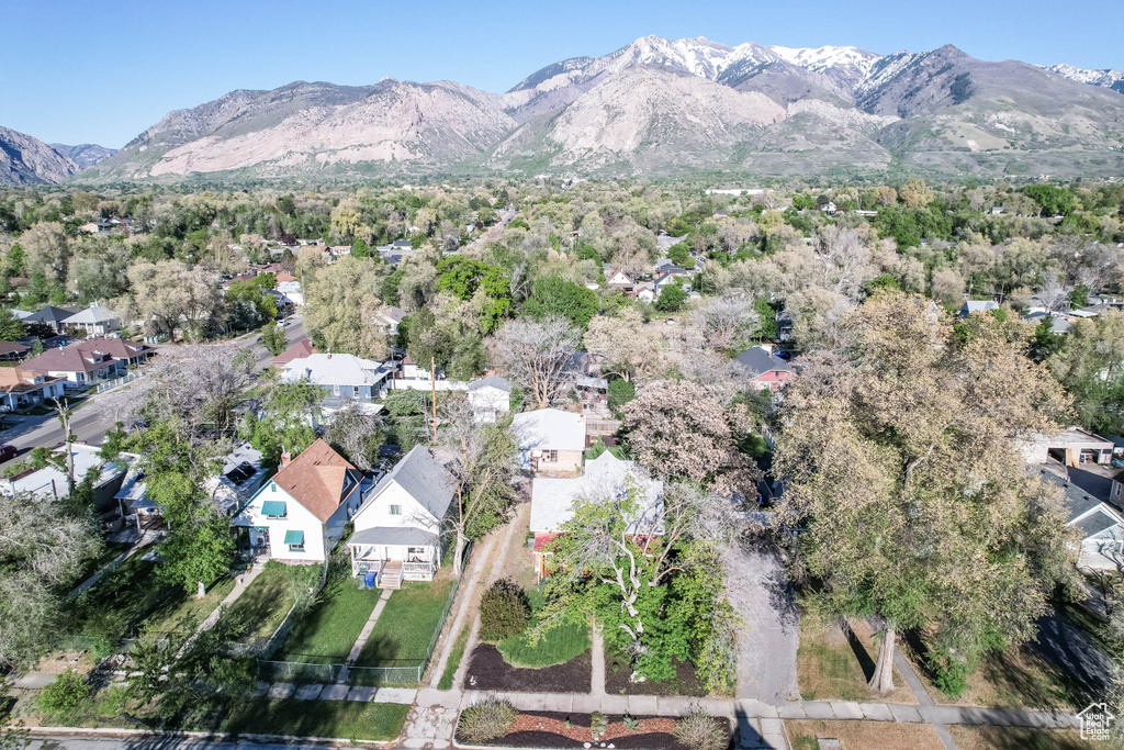 Birds eye view of property featuring a mountain view and a residential view