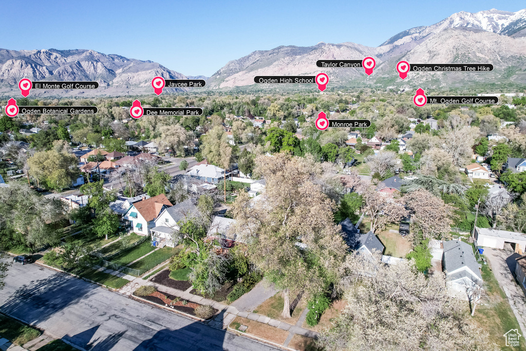 Drone / aerial view featuring a mountain view and a residential view