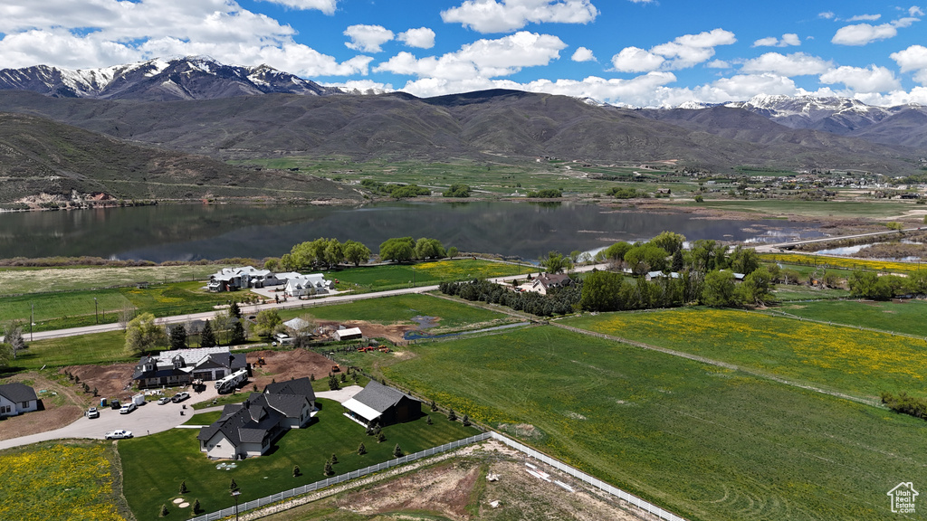 Aerial overview of property's location with a water and mountain view