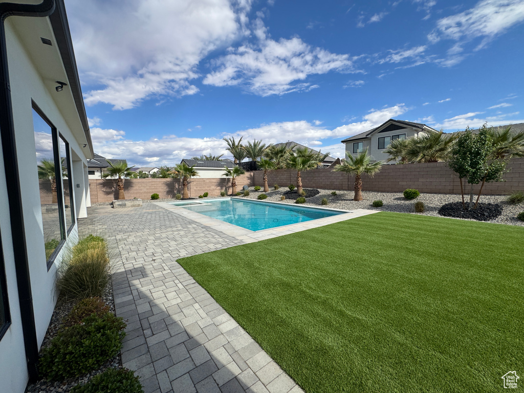 View of pool with a patio
