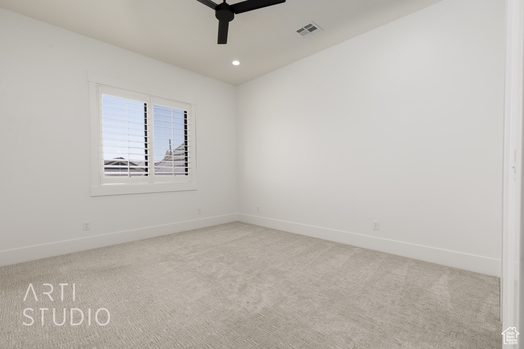 Empty room with ceiling fan, carpet flooring, baseboards, and recessed lighting
