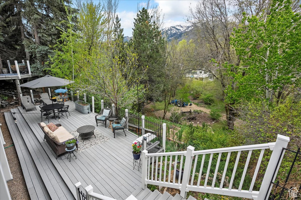 Wooden deck with outdoor dining space