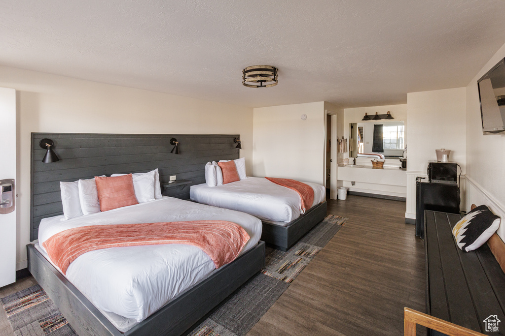 Bedroom featuring wood finished floors