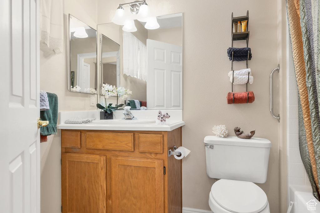 Bathroom featuring toilet and vanity