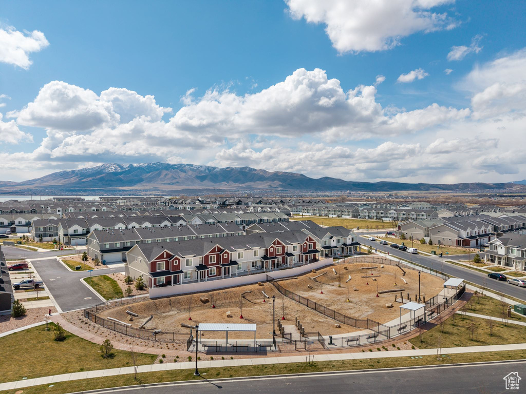 Aerial perspective of suburban area with a mountain backdrop