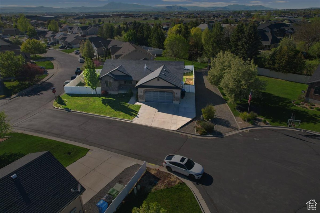 Drone / aerial view featuring a mountain view and a residential view