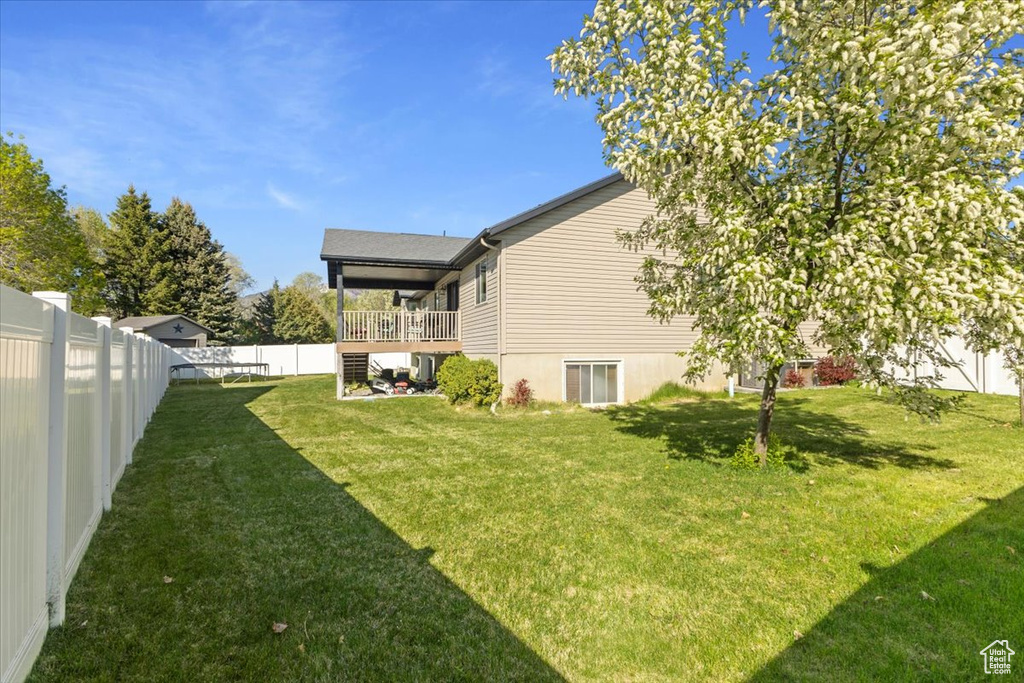 View of yard with a fenced backyard