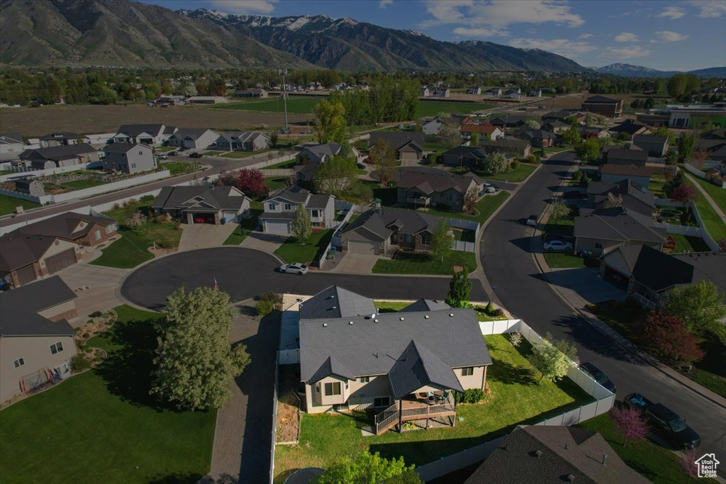 Drone / aerial view featuring a mountain view and a residential view