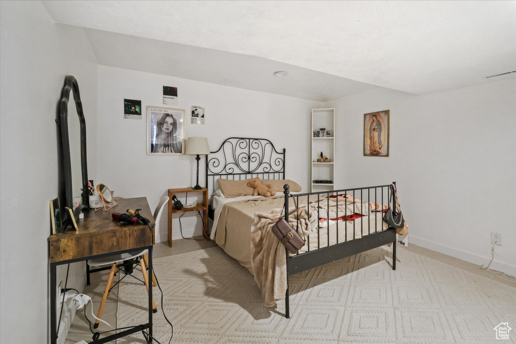 Bedroom featuring baseboards