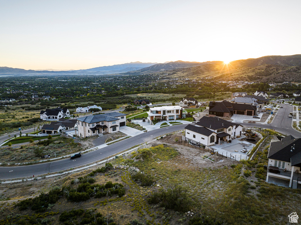 Aerial view at dusk of a mountain view and a residential view