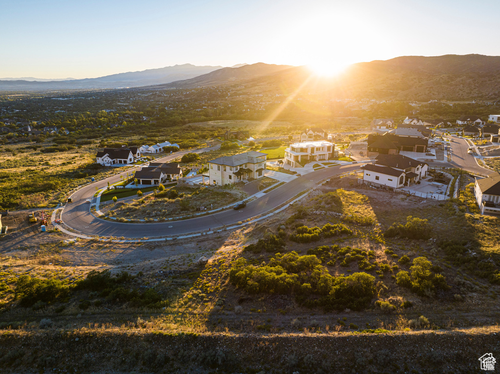 View of property location with a mountainous background and nearby suburban area