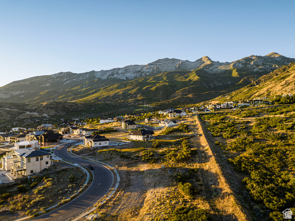 View of mountain backdrop with nearby suburban area