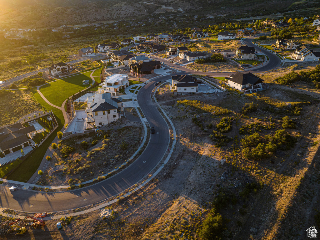 Aerial overview of property's location with nearby suburban area