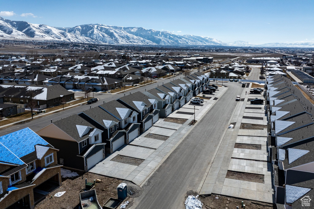Aerial view of residential area with a mountainous background