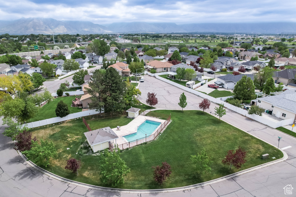 Drone / aerial view featuring a mountain view and a residential view